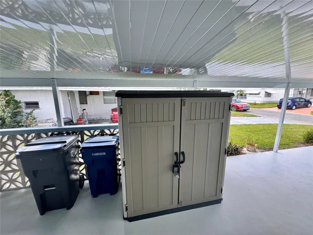 Shed on drive uner carport