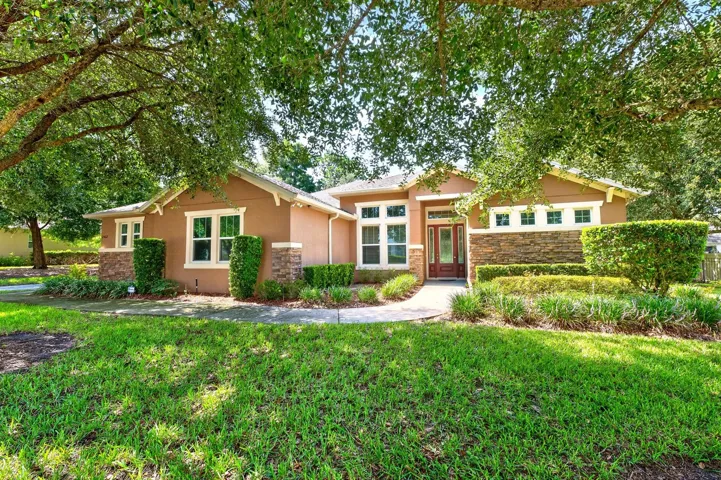 Set on a beautifully landscaped 1/3 ACRE LOT (.37) in the GATED Oak Ridge community of Apopka, this spacious 4-bedroom + office, 3-bath home offers the perfect blend of flexible living spaces, timeless design, and room to grow!