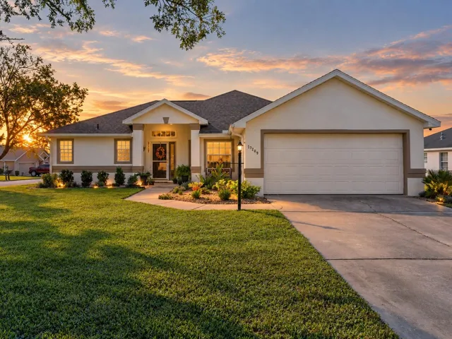 Exterior front of home situation on corner lot and features newer exterior paint and roof.