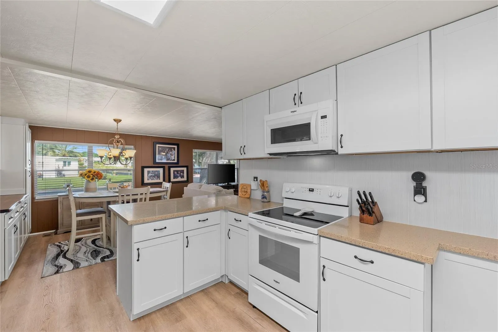 Spacious Kitchen with Corian countertops and lots of storage