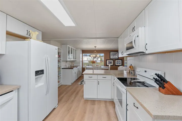 Fully remodeled Kitchen with new flooring, cabinets, countertops, appliances and fixtures