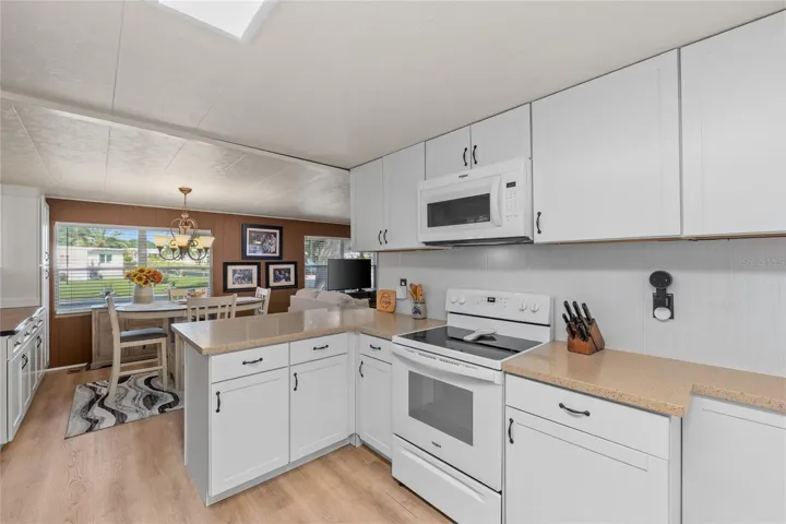 Spacious Kitchen with Corian countertops and lots of storage