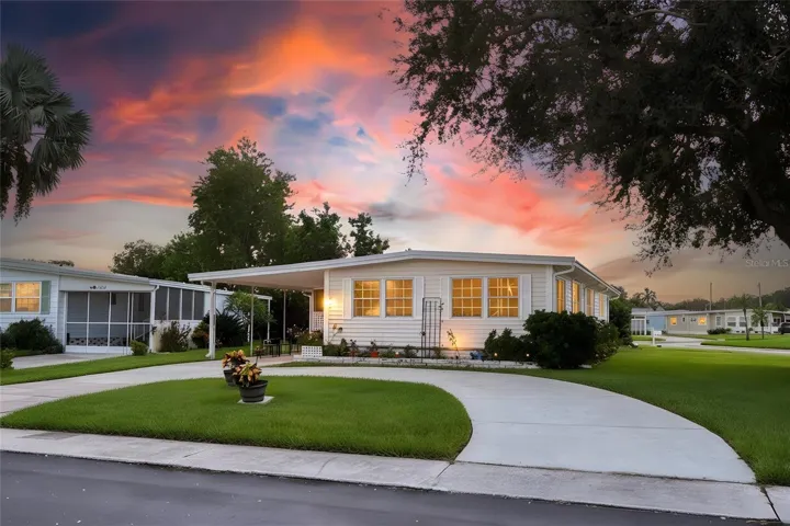 AND-OWNED CORNER LOT WITH CIRCULAR DRIVE – ADDED SPACE &amp; PRIVACY