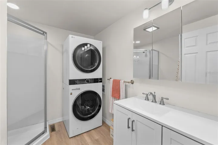 UPDATED PRIMARY BATH WITH NEW VANITY & MODERN FINISHES