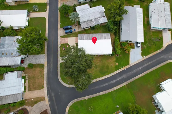 Huge corner lot with lots of space to park your golf cart