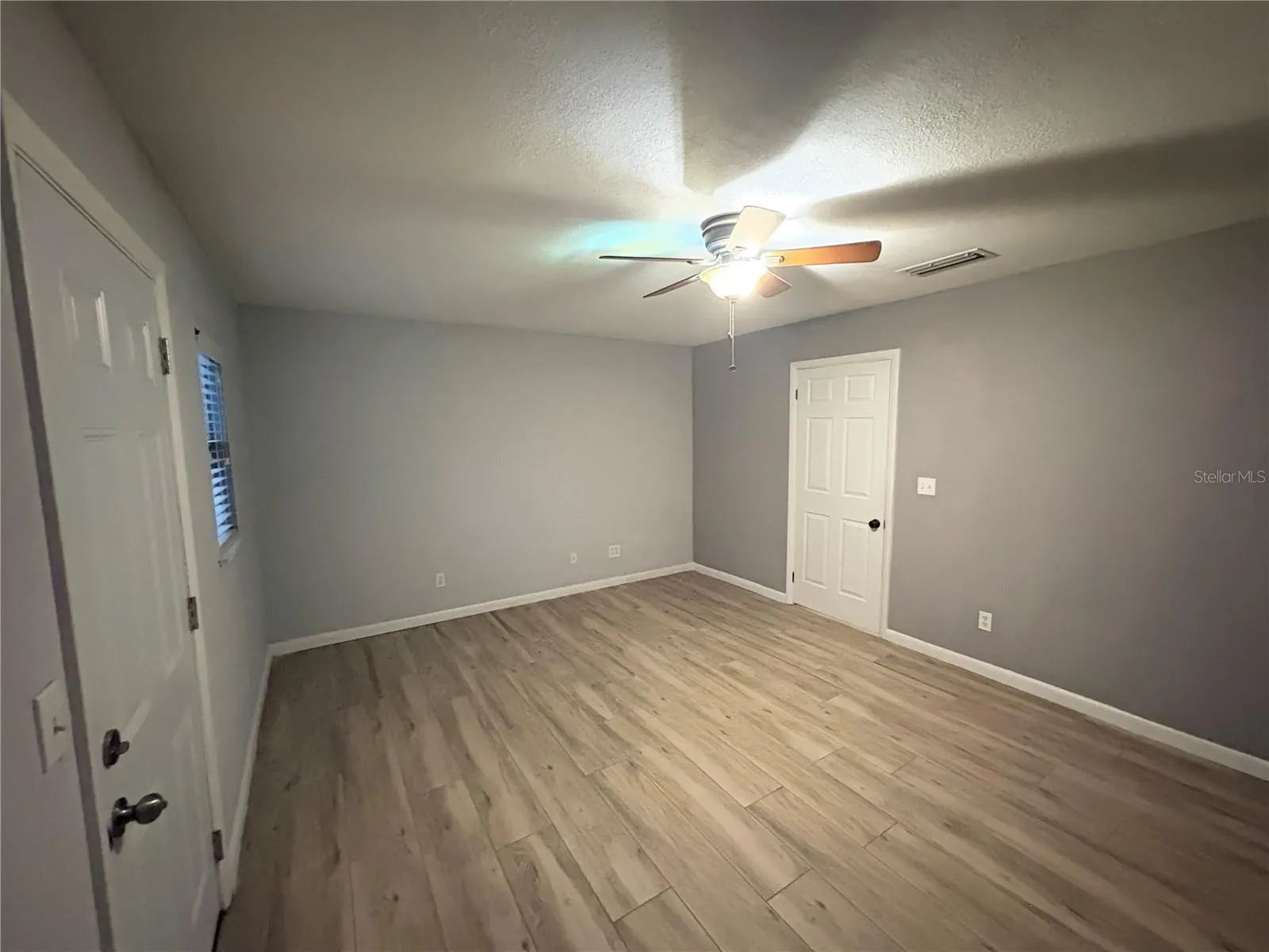 Bedroom 2 with Door to Backyard