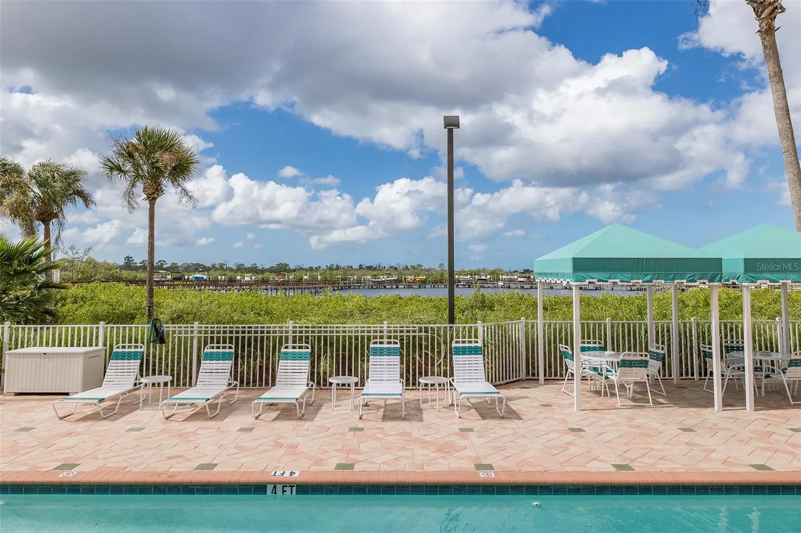 Community amenities include a fishing dock.