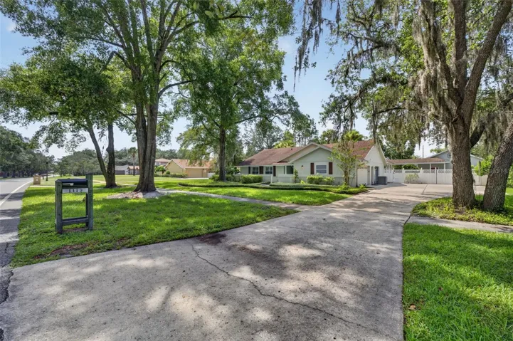 Extra long extended driveway with an extra wide parking pad