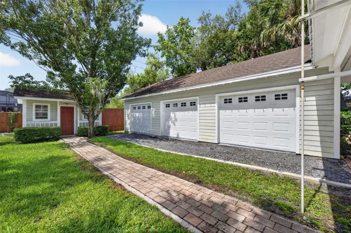 40ft x23ft studio building (920 SF) with 1/2 bath, attached via a covered walkway
