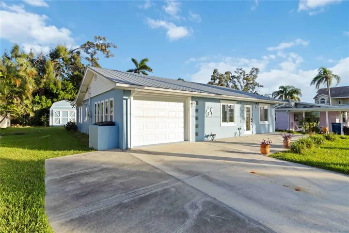 Front elevation with view of shed.