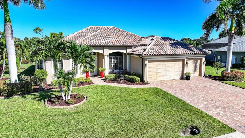 Very pretty curb appeal with beautiful landscaping.
