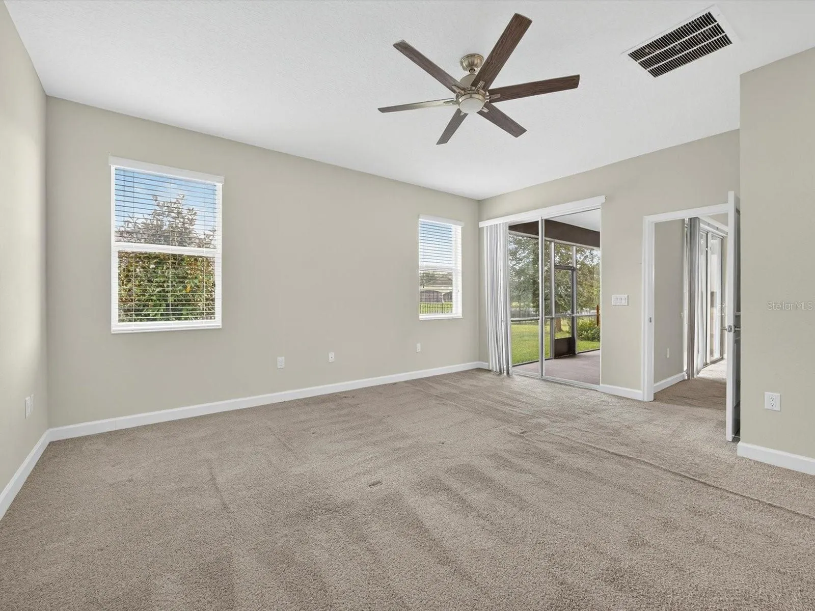 Primary Suite has sliders to lanai