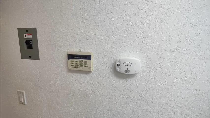 Security system keypad is located in the laundry room which you walk through when entering from the garage.
