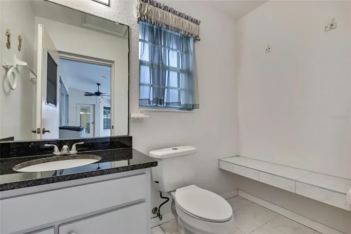 Pool area changing room in air conditioned half bath