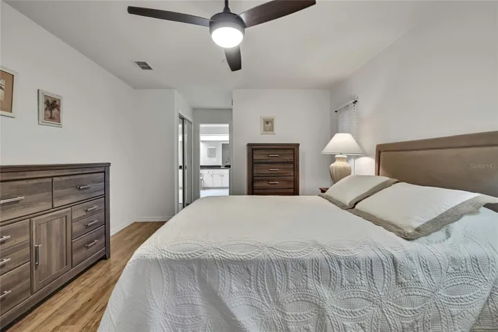 Large comfortable split bedroom plan primary bedroom.