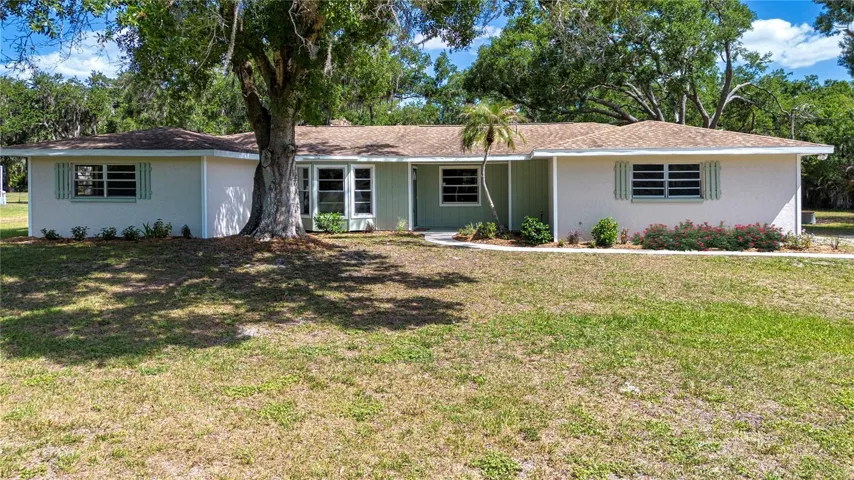 NICELY MANICURED FRONT YARD