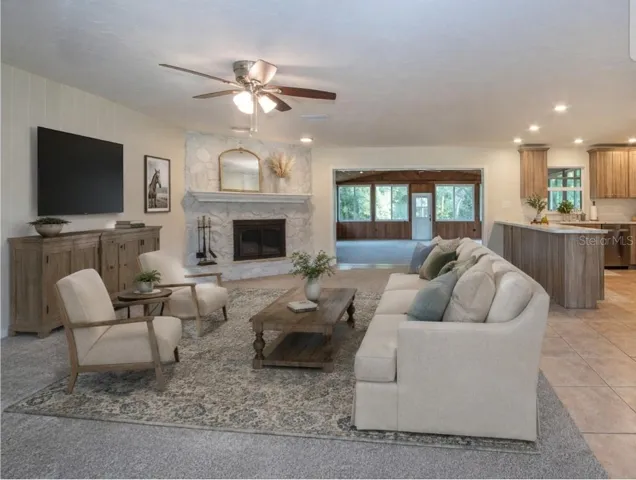 Staged photo in front of updated fireplace