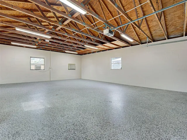 GARAGE - ALL NEW LIGHTING, ELECTRICAL UPDATED AND EPOXY FLOOR.