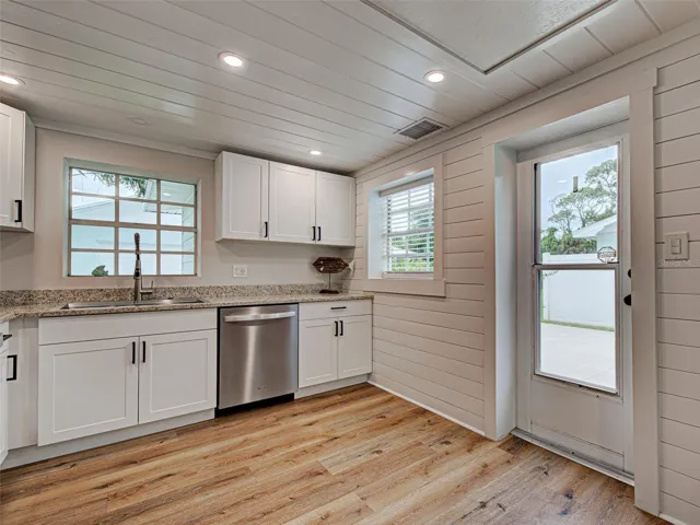 Kitchen - All newer cabinets, counters, appliances & flooring!