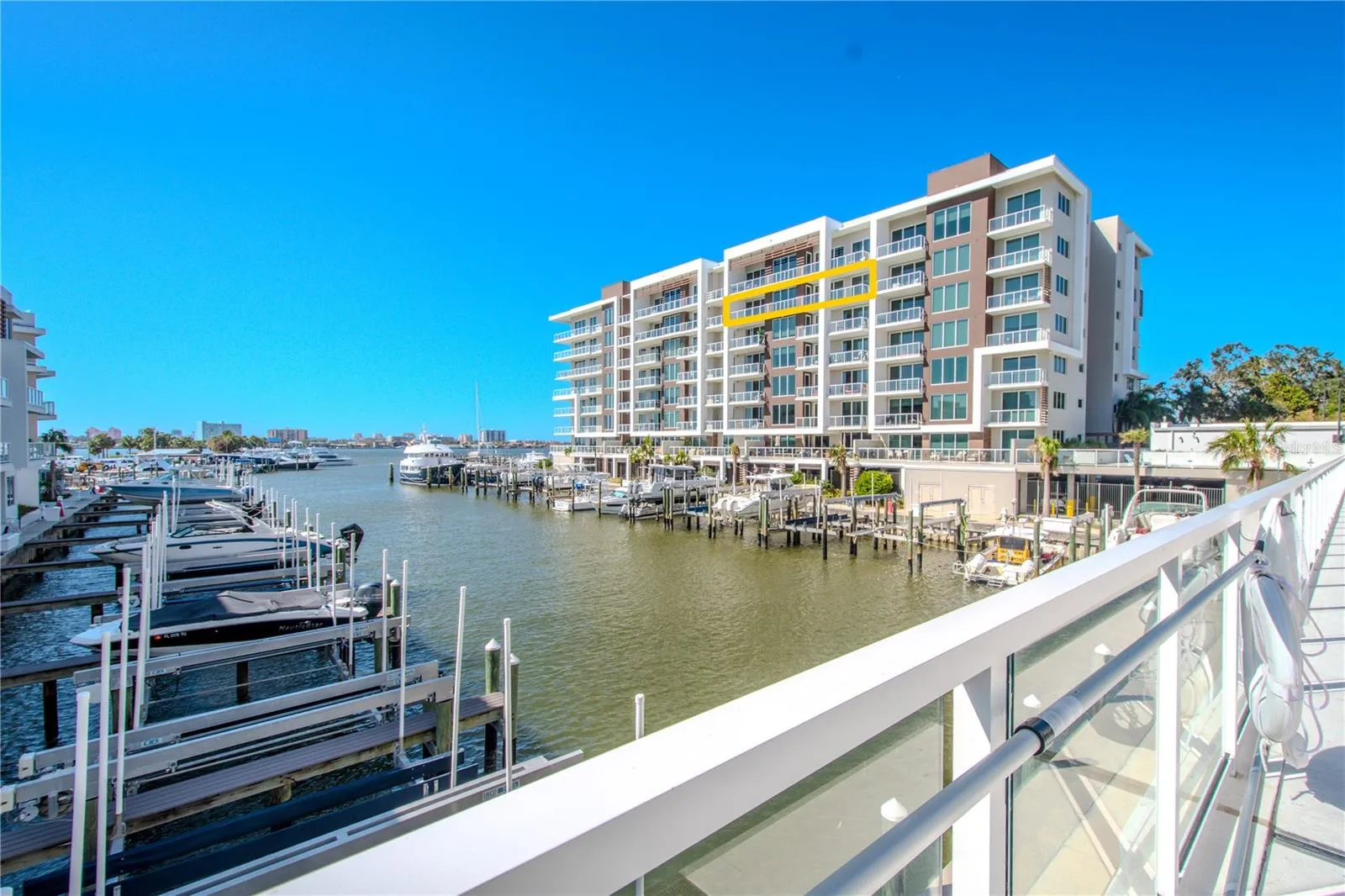 Marina Bay 880 offers breathtaking waterfront views, showcased through expansive floor-to-ceiling windows and sleek glass railings that ensure an uninterrupted connection to the sparkling Intracoastal below. Spacious terraces invite seamless indoor-outdoor living, allowing you to soak in the beauty of the marina, passing yachts, and vivid coastal skyline from every angle.