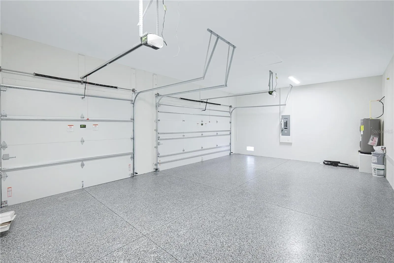 3-car, 720 sf garage with epoxy