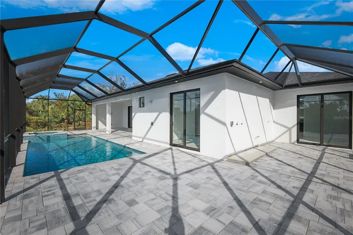 ENORMOUS, wrap-around pool deck with plumber summer kitchen, and private area for Junior Primary