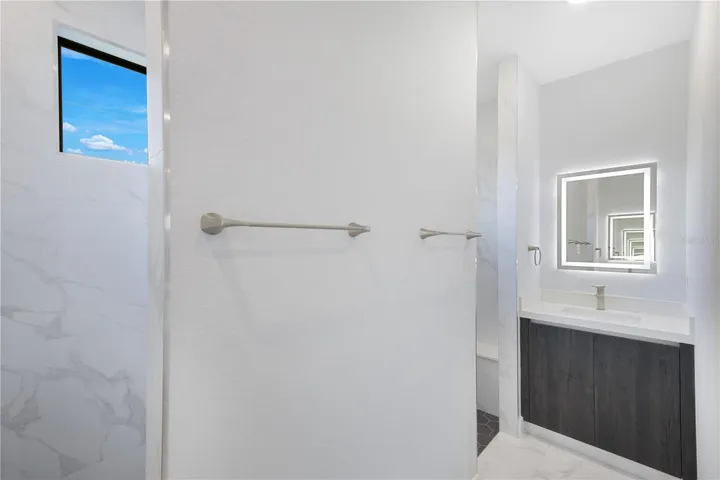 Primary Bathroom with Roman-styled shower