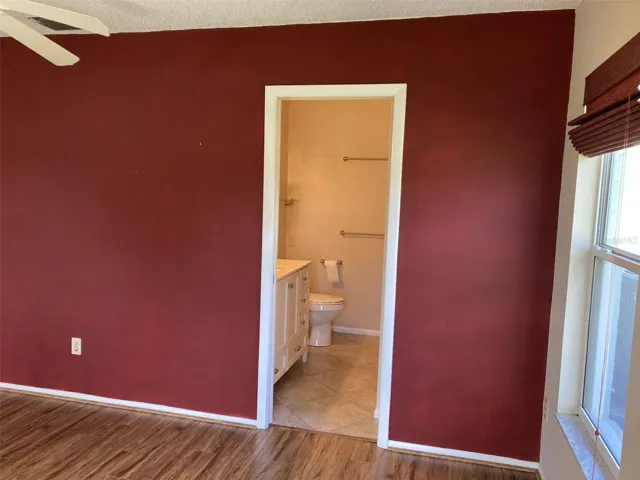 Master bedroom to private bathroom.