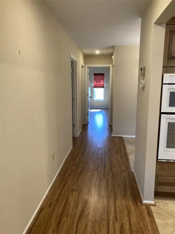 From living room to front door and bedrooms.