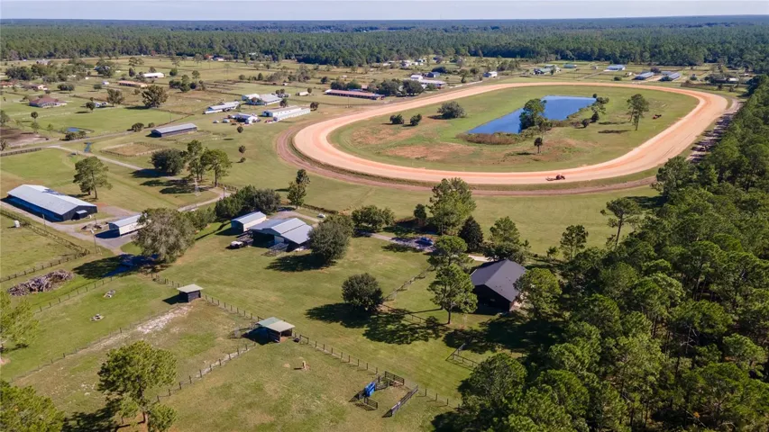 View of Paddocks, Home, Barn #1 & #2 and training Track