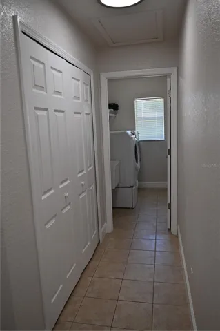 Hallway with Pantry to Laundry Room