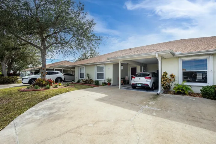 Welcome home to this delightful Villa with private carport