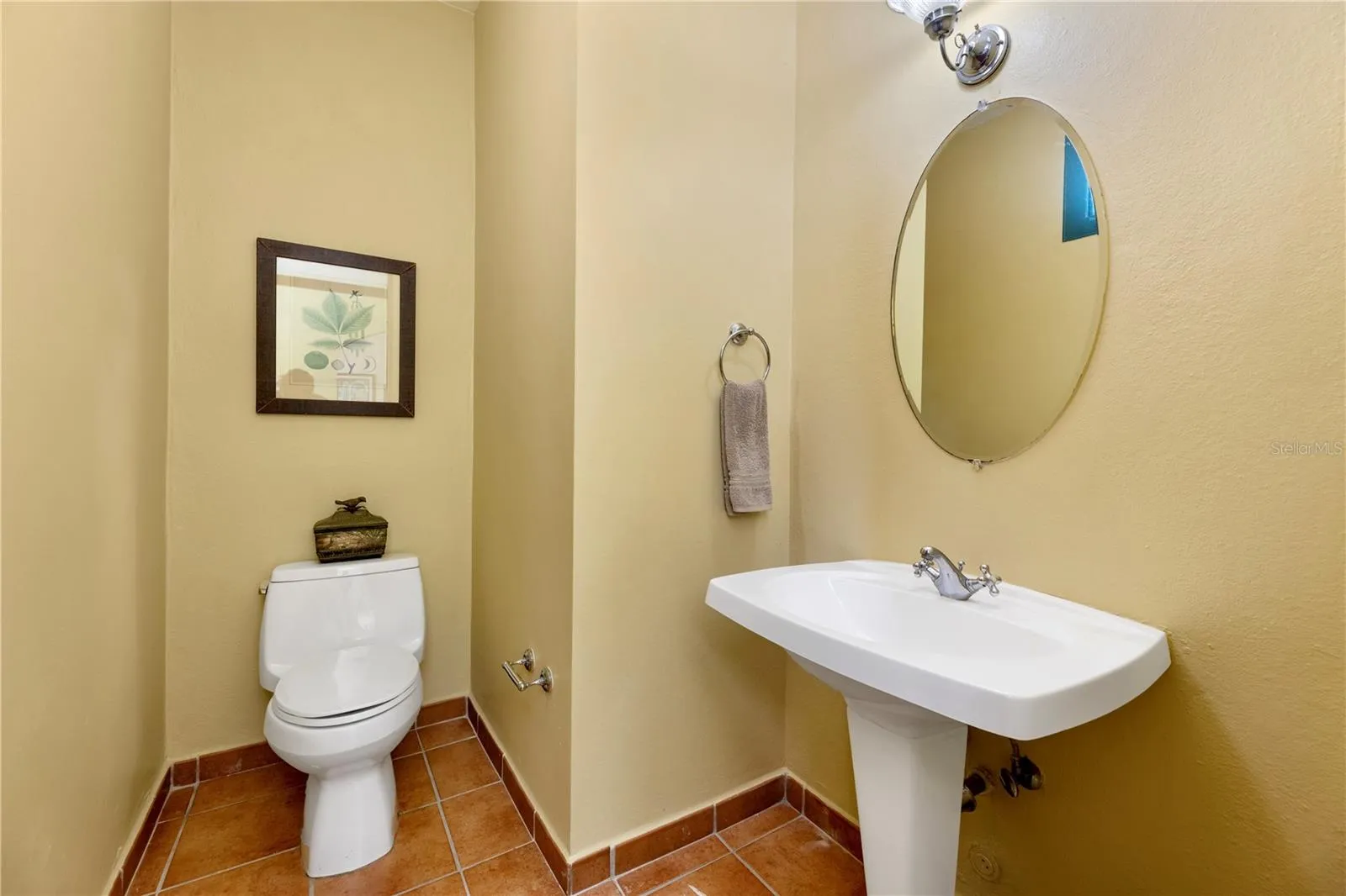 Guest half bath located right by main entry