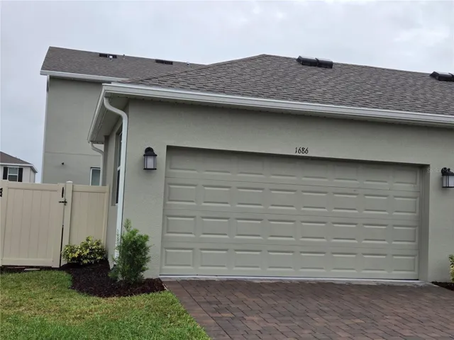 2 car garage plus 2 cars on the driveway.