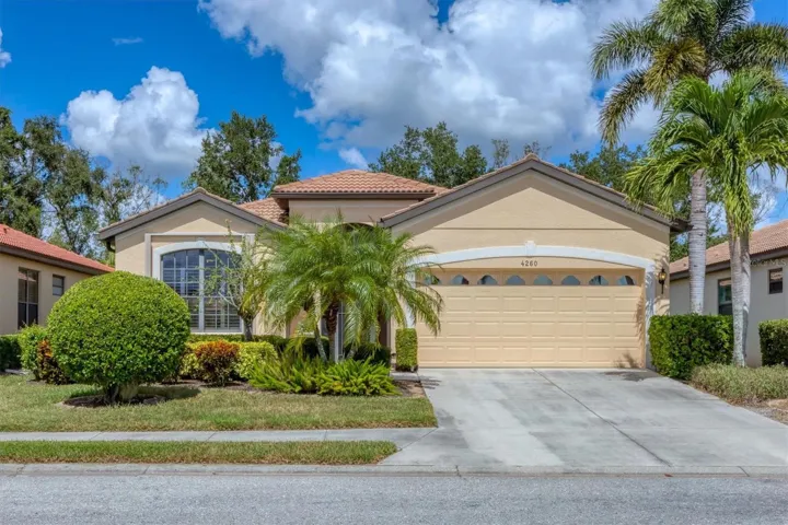 Located in a cul-de-sac, away from road noise, this Sutherland floor plan offers mature Florida landscaping. Don't let the exterior fool you- this home is not to be missed!