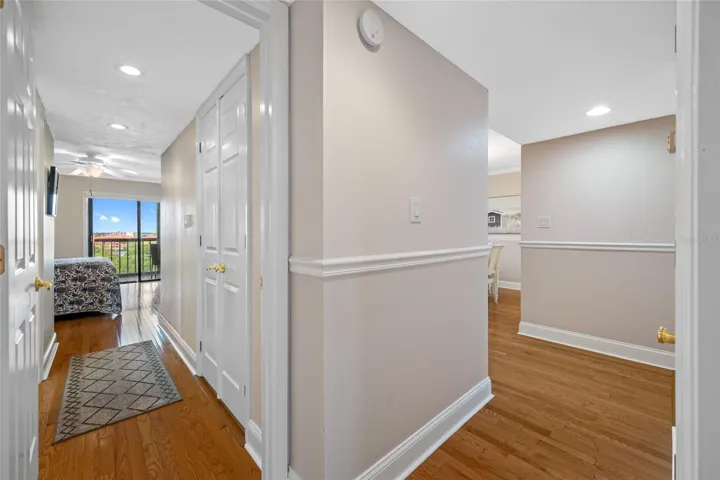 Private hall to primary bedroom, ensuite, and walk-in closet