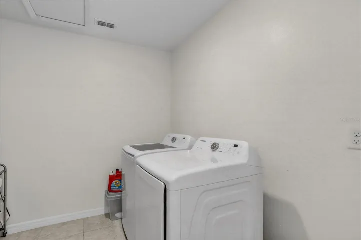 Extra large upstairs laundry room - easy to wash and put away clothes
