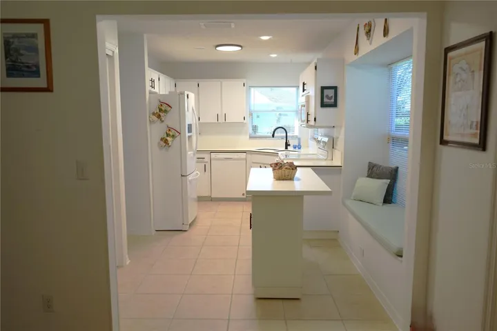 looking into kitchen from bonus area