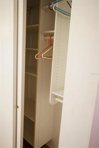 linen closet by guest bedroom