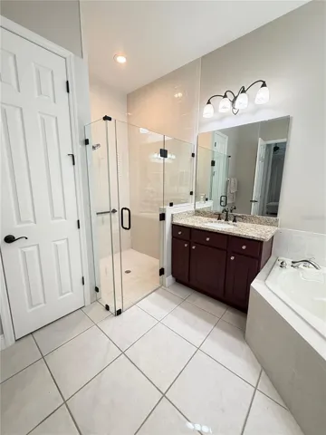 New (26) Seamless Glass Shower Enclosure. Granite Counters