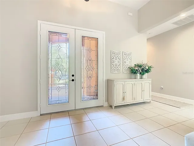 Foyer w/ French Doors.