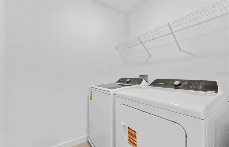 Laundry Room w/Whirlpool washer and dryer