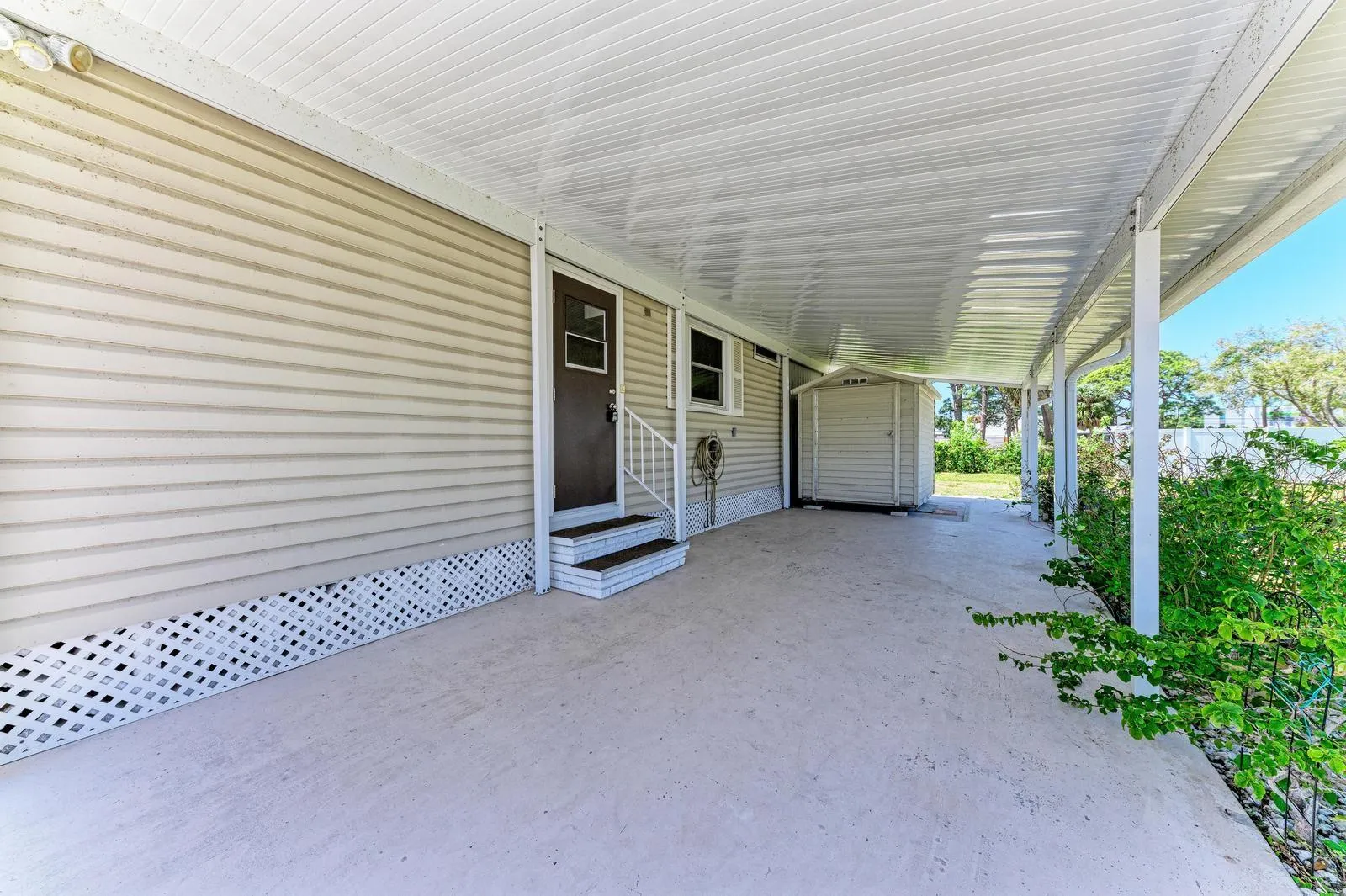 2-yr-old carport with shed for washer/dryer