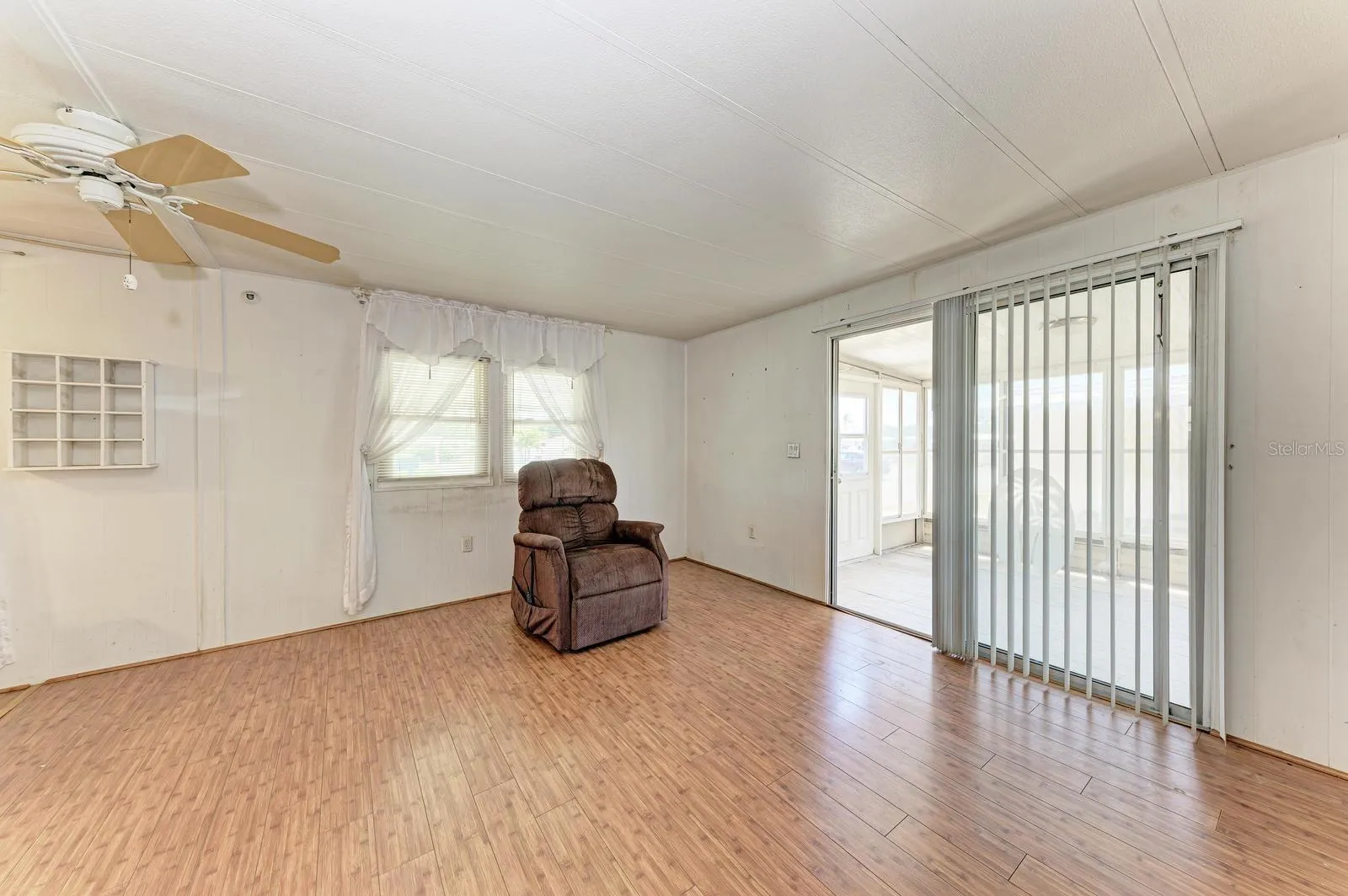 Living room with recliner massage  chair.   It's included.