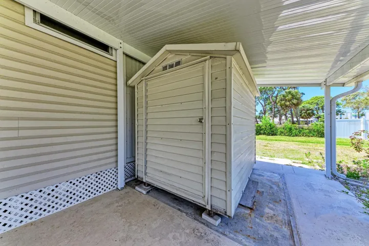 The shed in the carport.  Washer Dryer PLUS  Extra storage