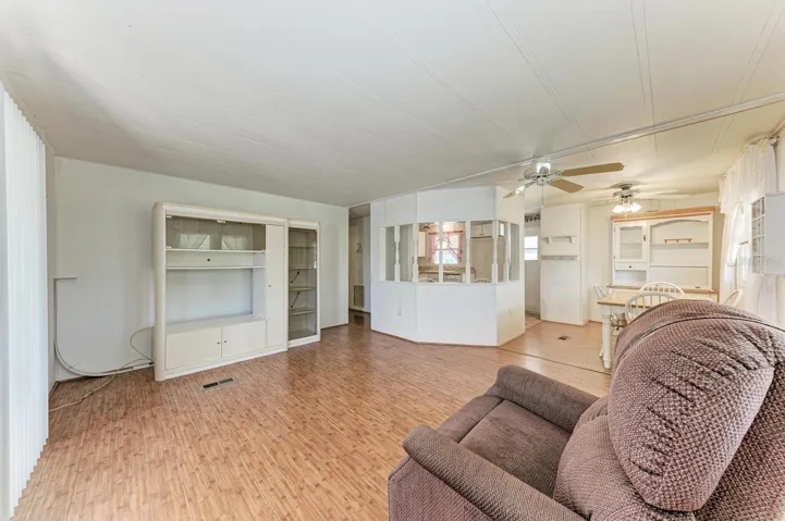 Living room with entertainment center across the room