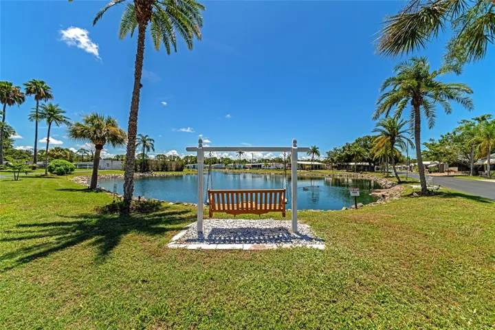 Just imagine sitting here...watching the water and the palm trees ..and being so glad you moved here!
