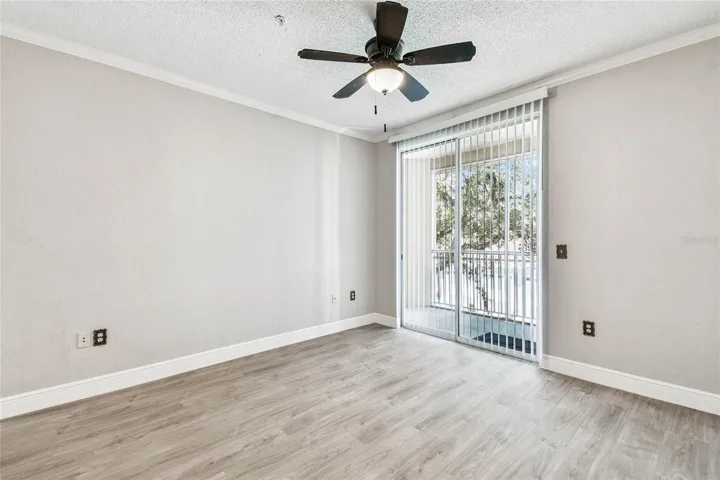 Living room w/ sliders to balcony