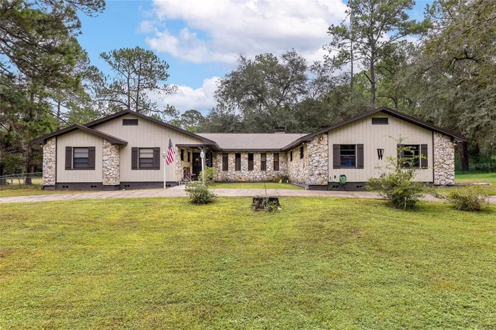 This beautiful 3 bedroom 2 bathroom is situated on 5 acres.
