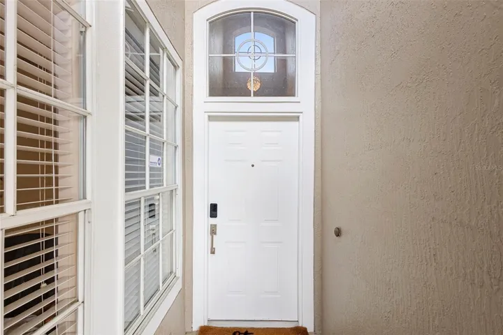 FRONT DOOR LEADING INTO PROPERTY.